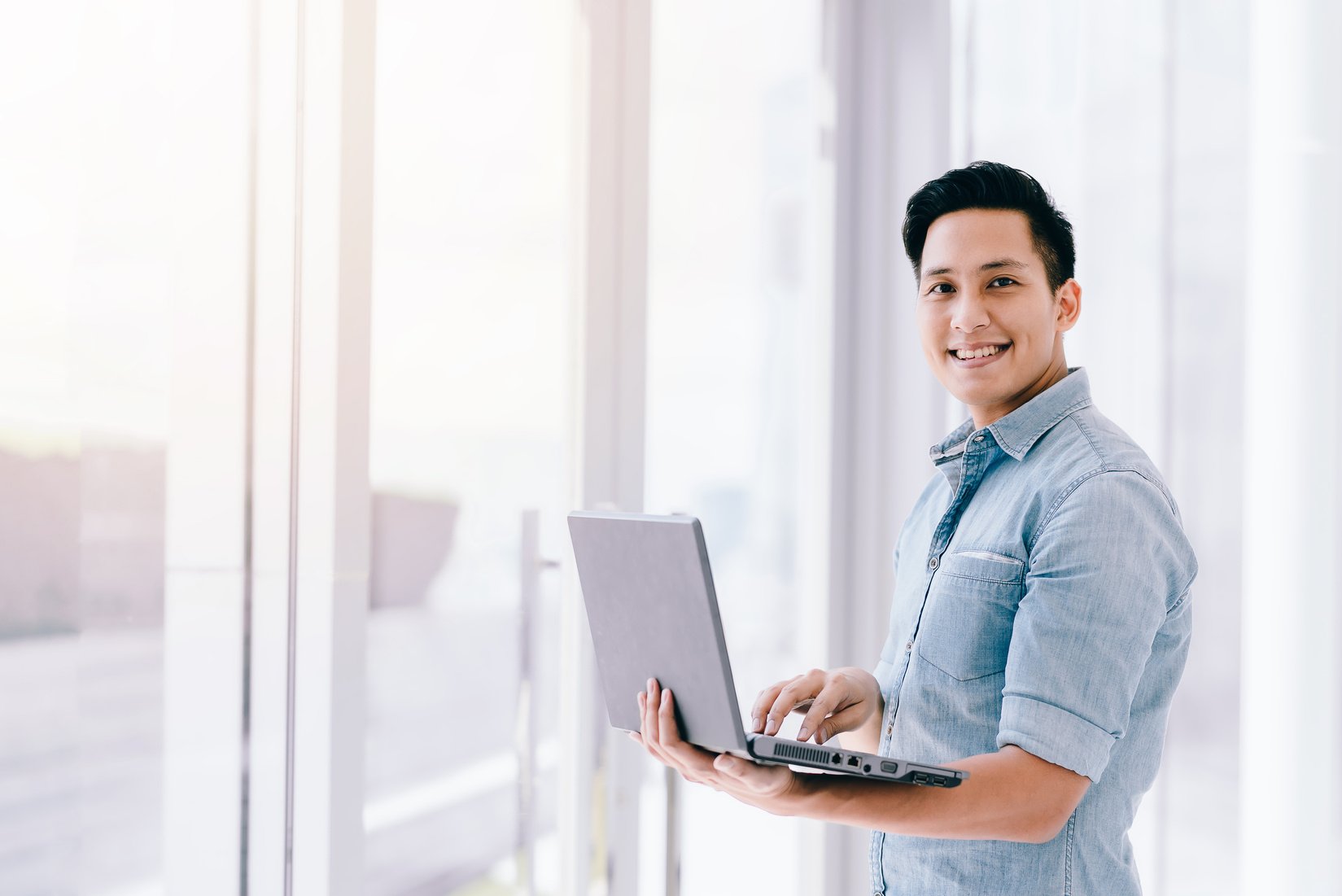 Man Using a Laptop in the Office